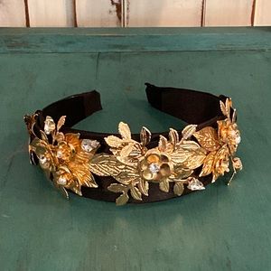 Stunning headband fit for a queen! Beautiful ornate gold adorned black satin.